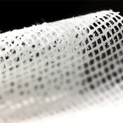 Close-up view of a sterile gauze dressing with an open weave structure, ideal for wound care and healing support