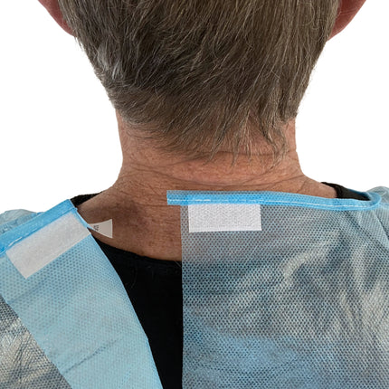 Ultra Health Isolation Gown PP/PE impervious blue knitted cuff, velcro neck close up