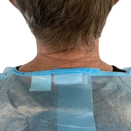 Ultra Health Isolation Gown PP/PE impervious blue knitted cuff, velcro neck close up