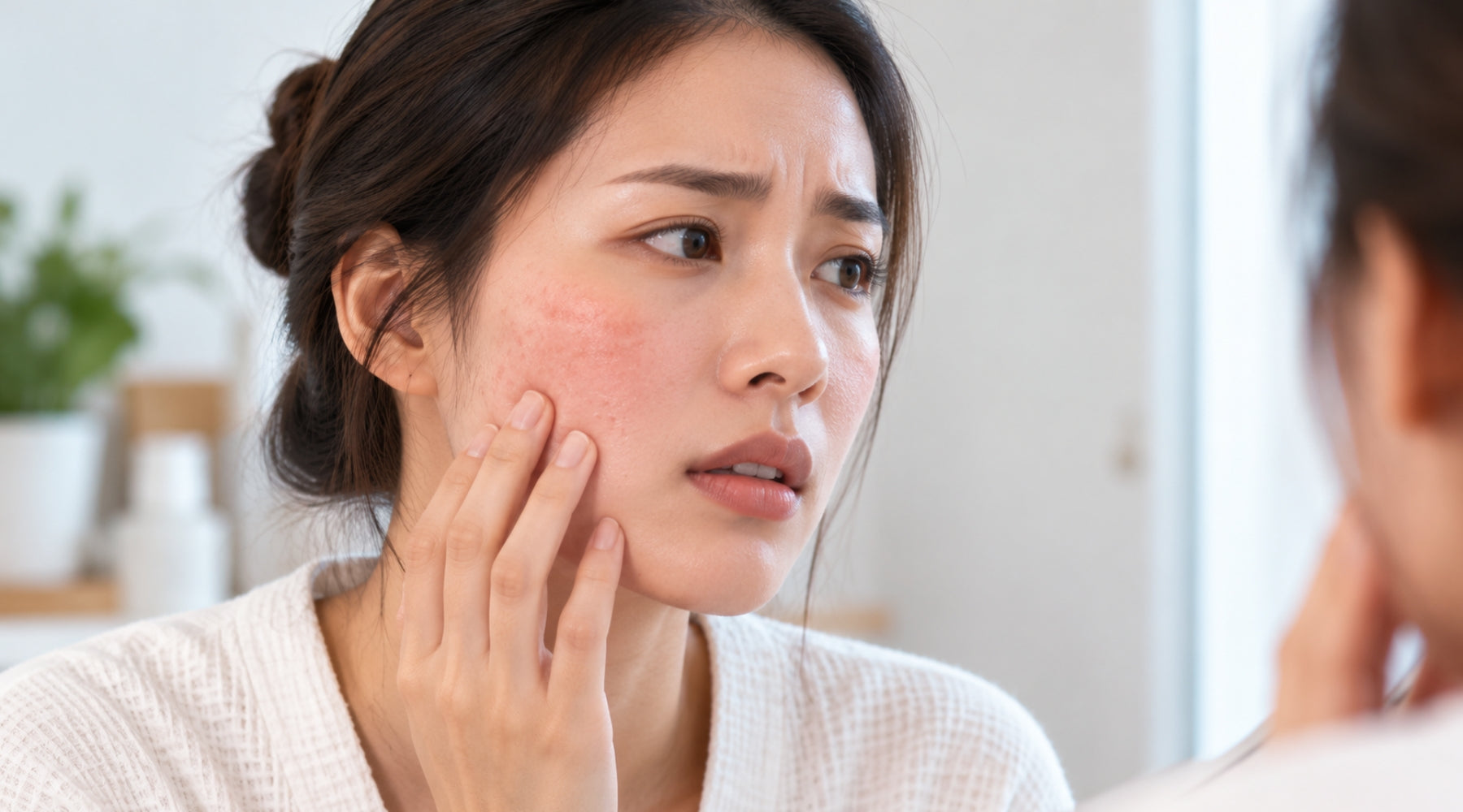 Woman checking out her eczema skin 