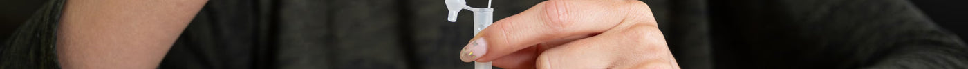 Woman doing self test for COVID, RSV and influenza at home