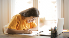 Student doing schoolwork at home