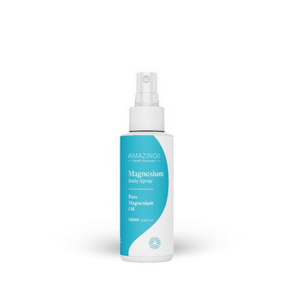 A white bottle of AMAZING You Magnesium Daily Spray with a teal and white label, shown on a clean white background with a soft shadow.