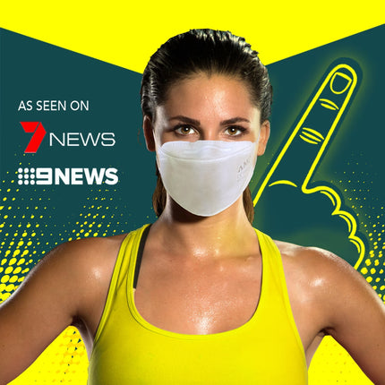 Australian athlete outdoors wearing an AMD white P2 mask for training and air protection