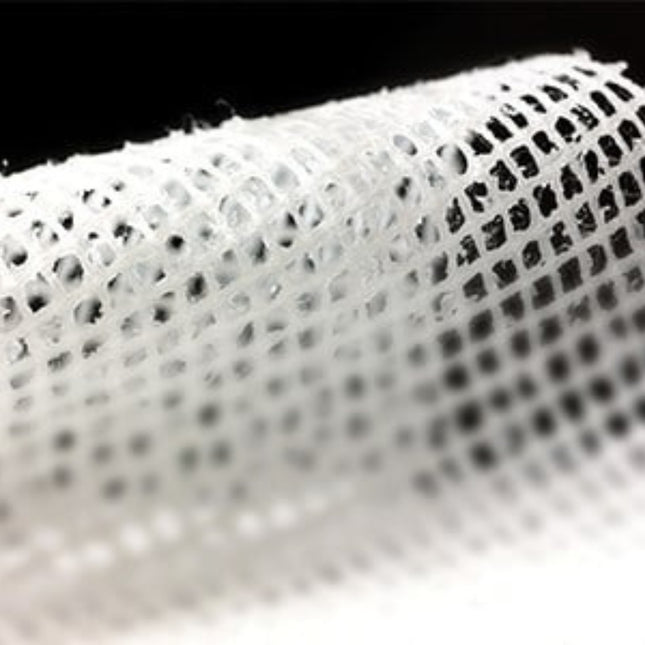 Close-up view of a sterile gauze dressing with an open weave structure, ideal for wound care and healing support