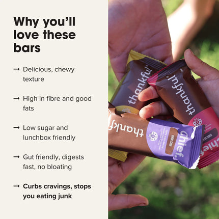 Hands holding Chief Thankful protein bars with text highlighting benefits on the left