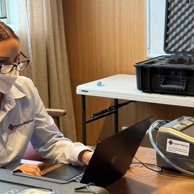 Aussie Pharma Direct team member wearing an AMD P2 face mask in office