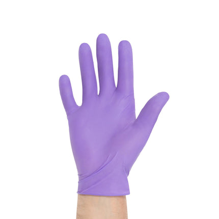 Person donning Halyard Purple cytotoxic nitrile glove designed for chemotherapy drug protection and high-risk medical environments.