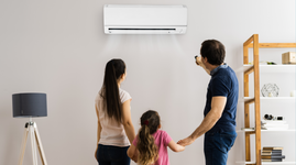 Family turning on the AC in the living room
