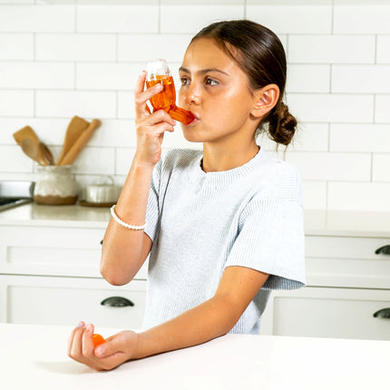 A child using the Better Breathing Kids device