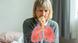 Elderly woman coughing