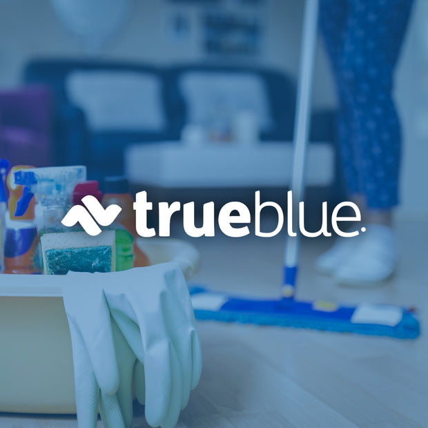 Person cleaning a room with cleaning supplies and 'True Blue' logo overlay.