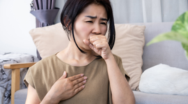 Woman having whooping cough