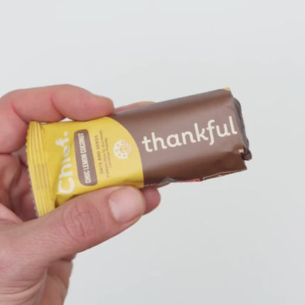 Chief Thankful Bar Choc Lemon flavour broken in two to show the content of the snack bar