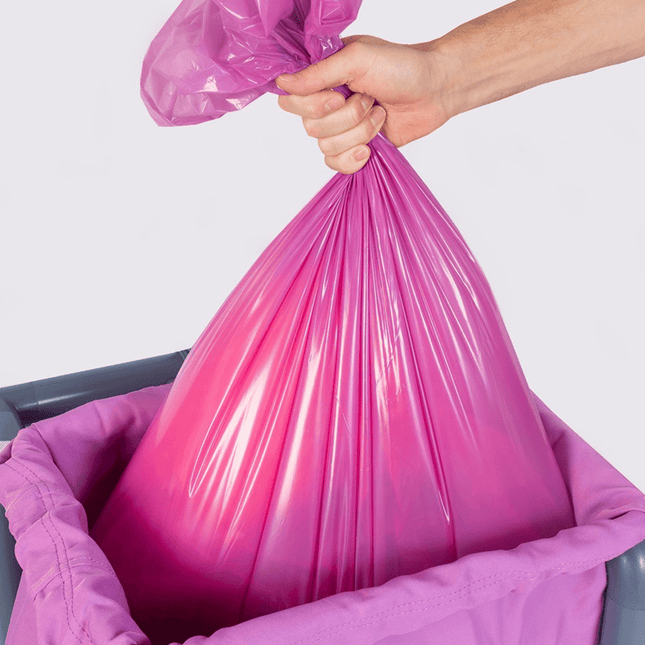 Purple alginate bag designed for hygienic handling of soiled laundry, fully dissolvable in hot wash cycles