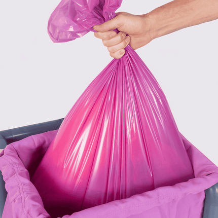 Disposable purple alginate bag that dissolves during the wash cycle, ideal for healthcare facilities