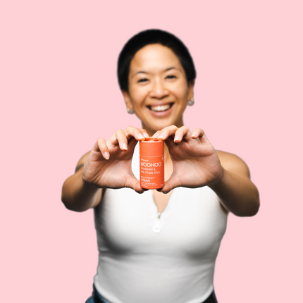 Woman loving the Woohoo URBAN deodorant stick